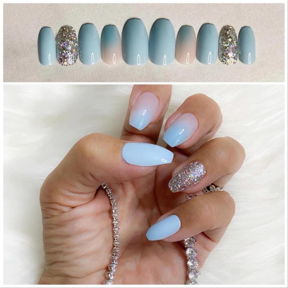 Blue and glitter glue on nails